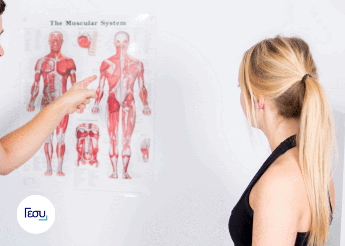 Therapist showing chart of human body