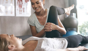 Physiotherapist providing back pain treatment in Nicosia clinic
